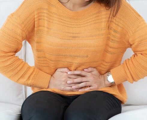 woman have bladder pain sitting on sofa after wake up feeling so sick and painful,Healthcare concept; blog: managing irritable bowel syndrome ibs
