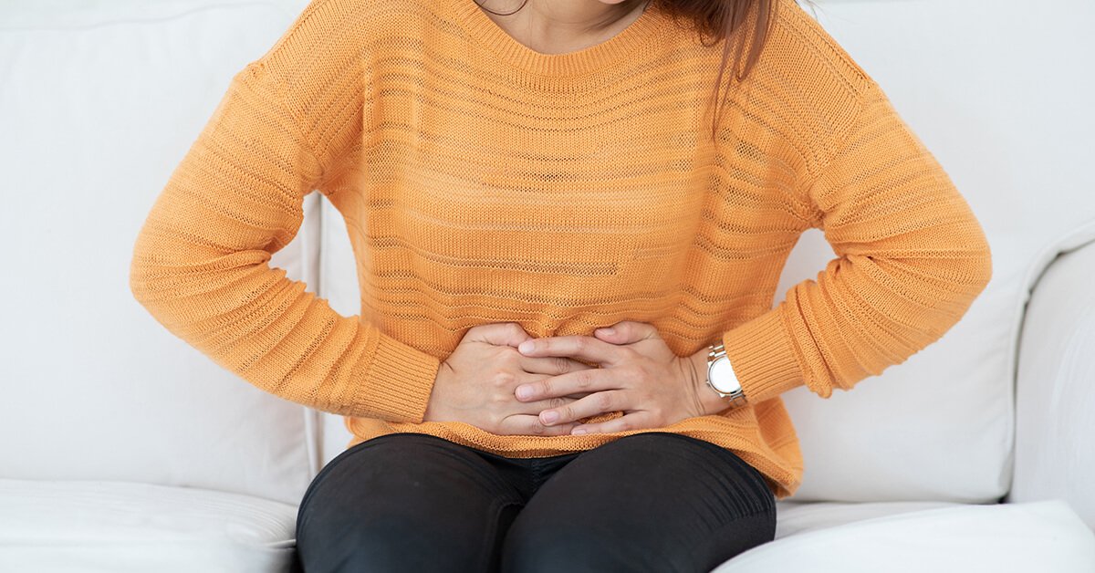 woman have bladder pain sitting on sofa after wake up feeling so sick and painful,Healthcare concept; blog: managing irritable bowel syndrome ibs