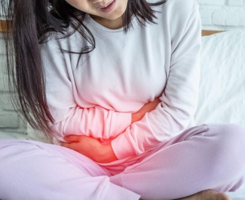 woman have bladder pain sitting on bed in bedroom after wake up feeling so sick and painful,Healthcare concept; blog: is there a cure for ibs?