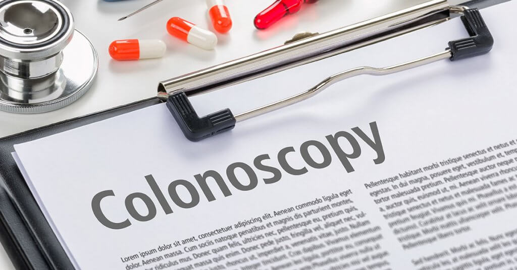 The text Colonoscopy written on a clipboard; blog: Do You Know How Often You Should Get a Colonoscopy?