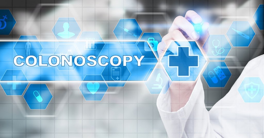 Medical doctor drawing colonoscopy on the virtual screen; blog: 4 Signs You May Need a Colonoscopy