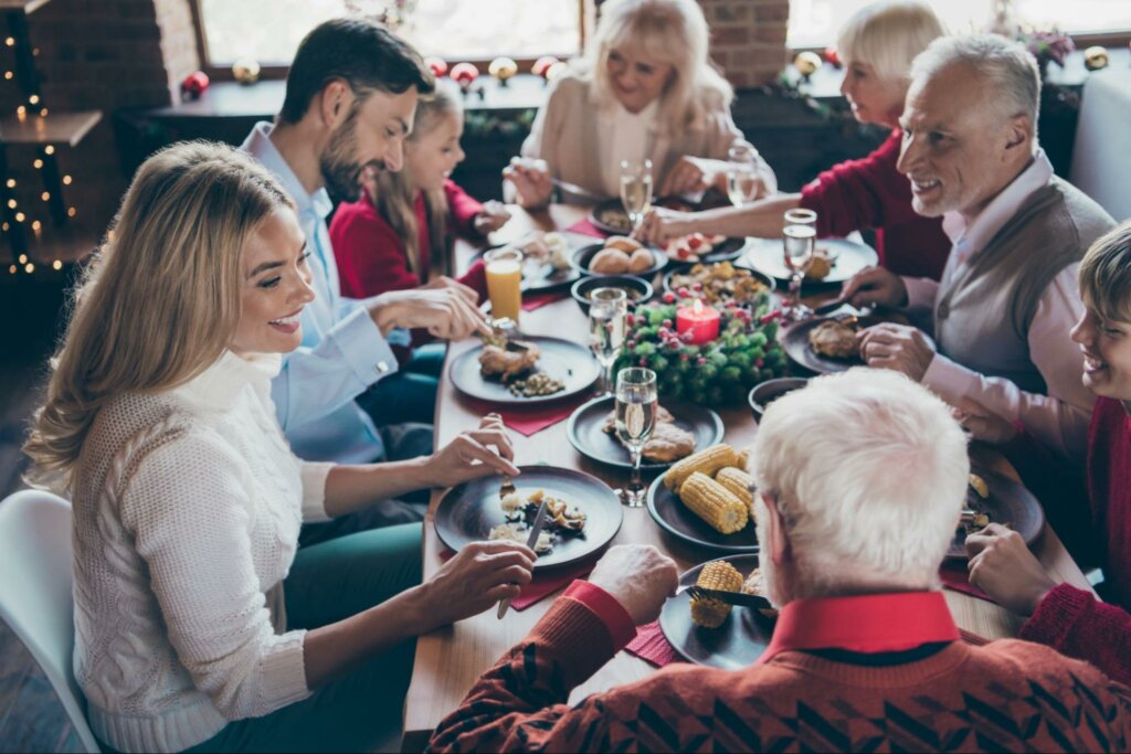 A family at a holiday party to represent Digestive Health Over the Holidays