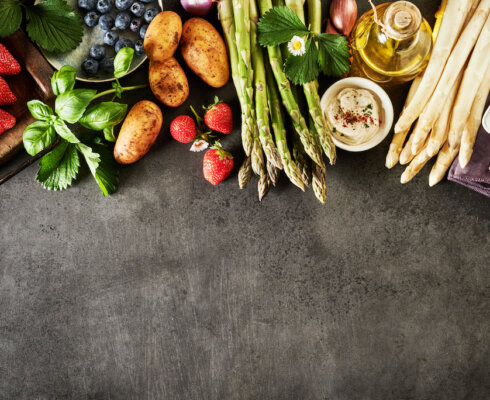 Healthy fresh spring fruit and vegetable border / blog - spring foods to improve gut health